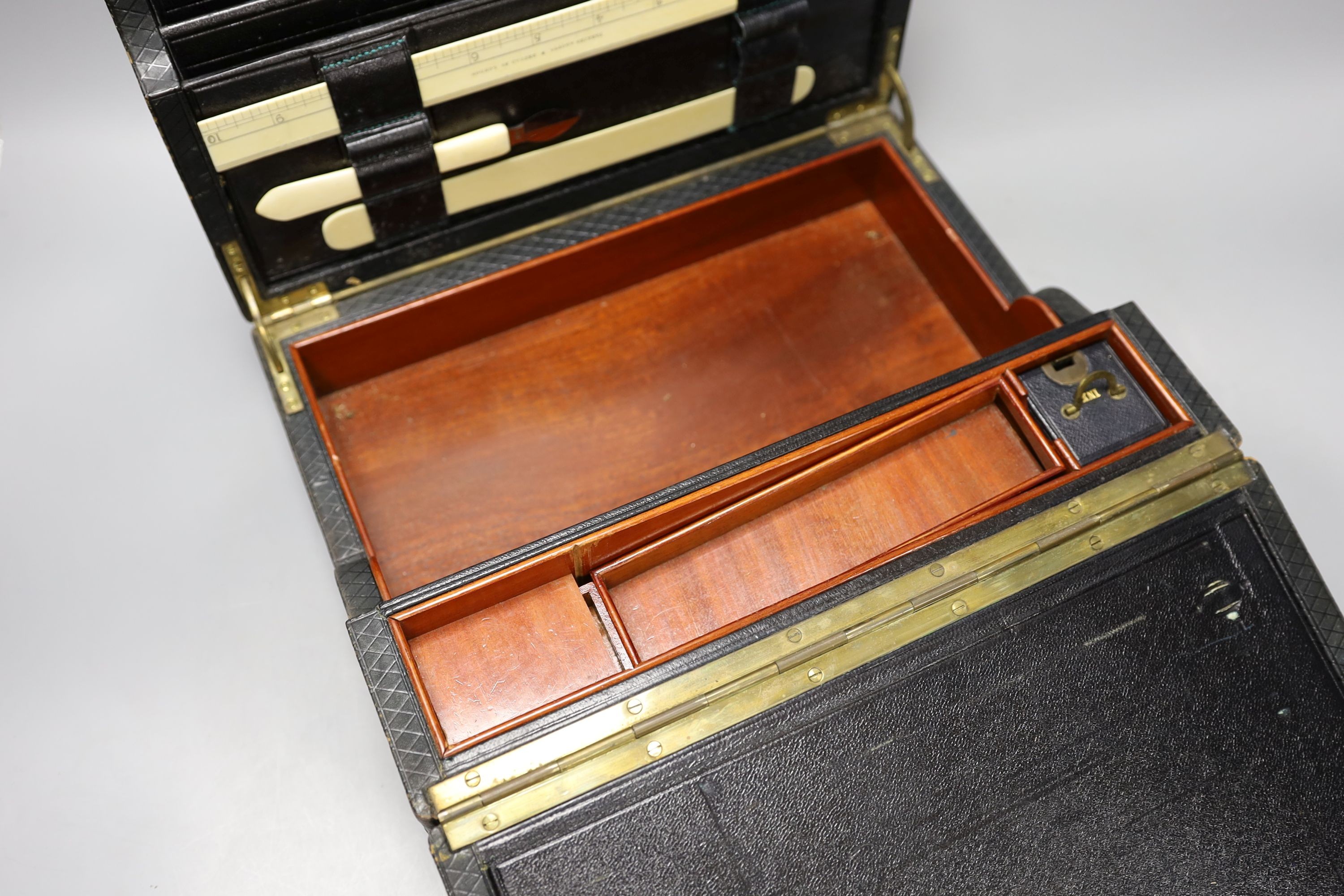 A late Victorian Morocco leather cased writing box, 32cm wide